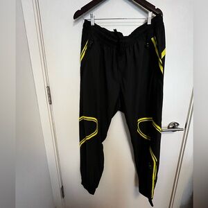 Adidas running track pants with dayglo reflective stripe worn once